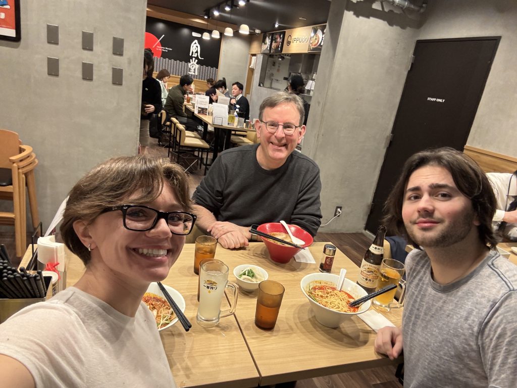 Professor Del Testa sits across the table from students Amanda Cullen and Ian Marsh enjoying ramen